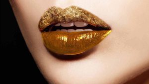 Bold gold lipstick