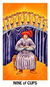 The Nine of Cups Tarot Card upright