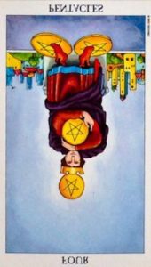 The Four of Pentacles Tarot Card (Reversed)