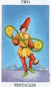 The Two of Pentacles Tarot Card (Upright)